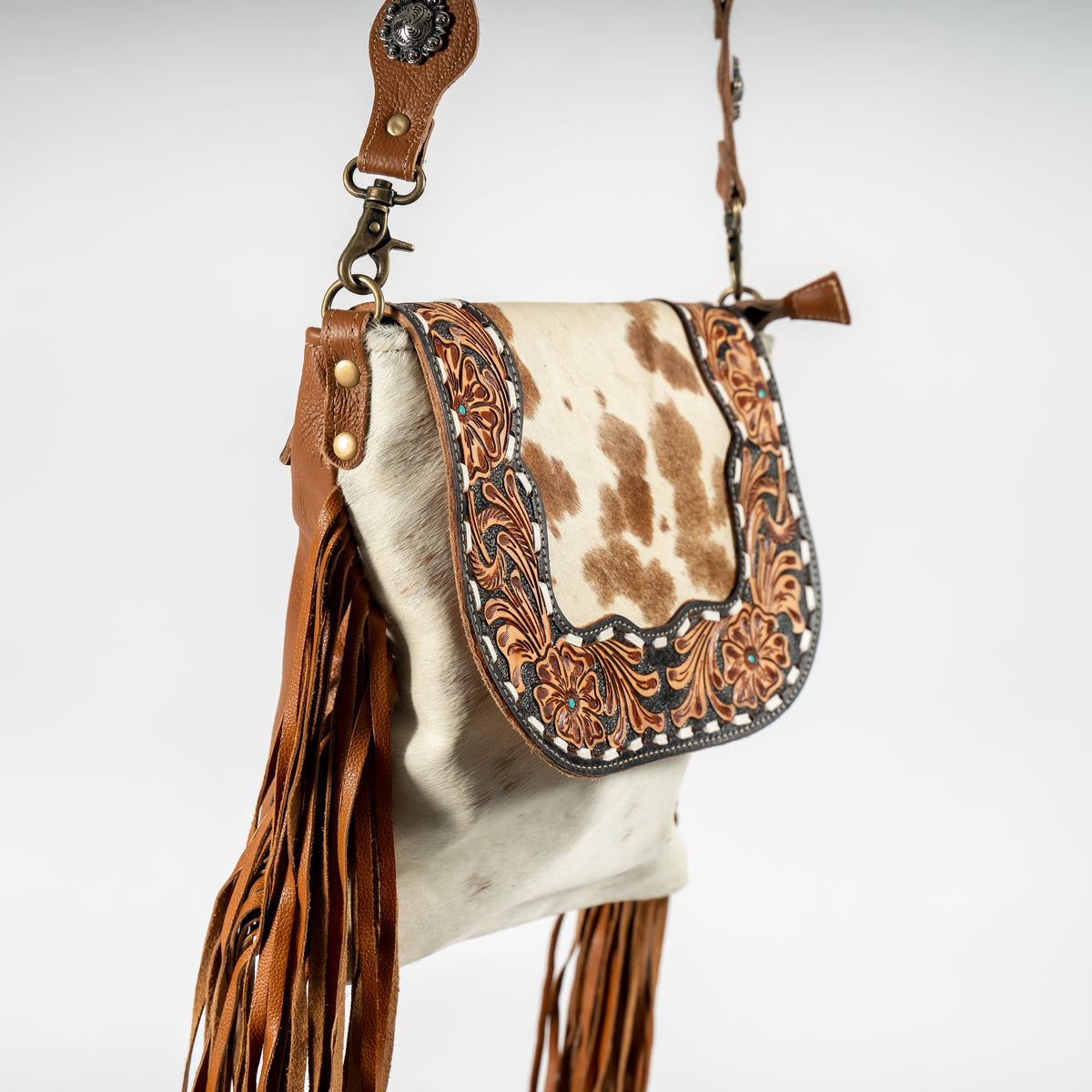 Cowhide and Fringe Hand-Tooled Purse