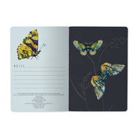 Butterflies on White Notebook