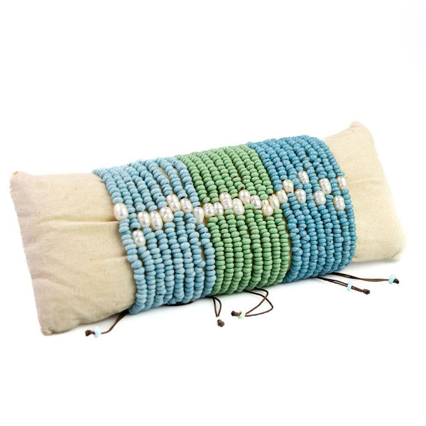 Dolly Glass Beads with a Freshwater Pearl Pull Bracelet: Beach