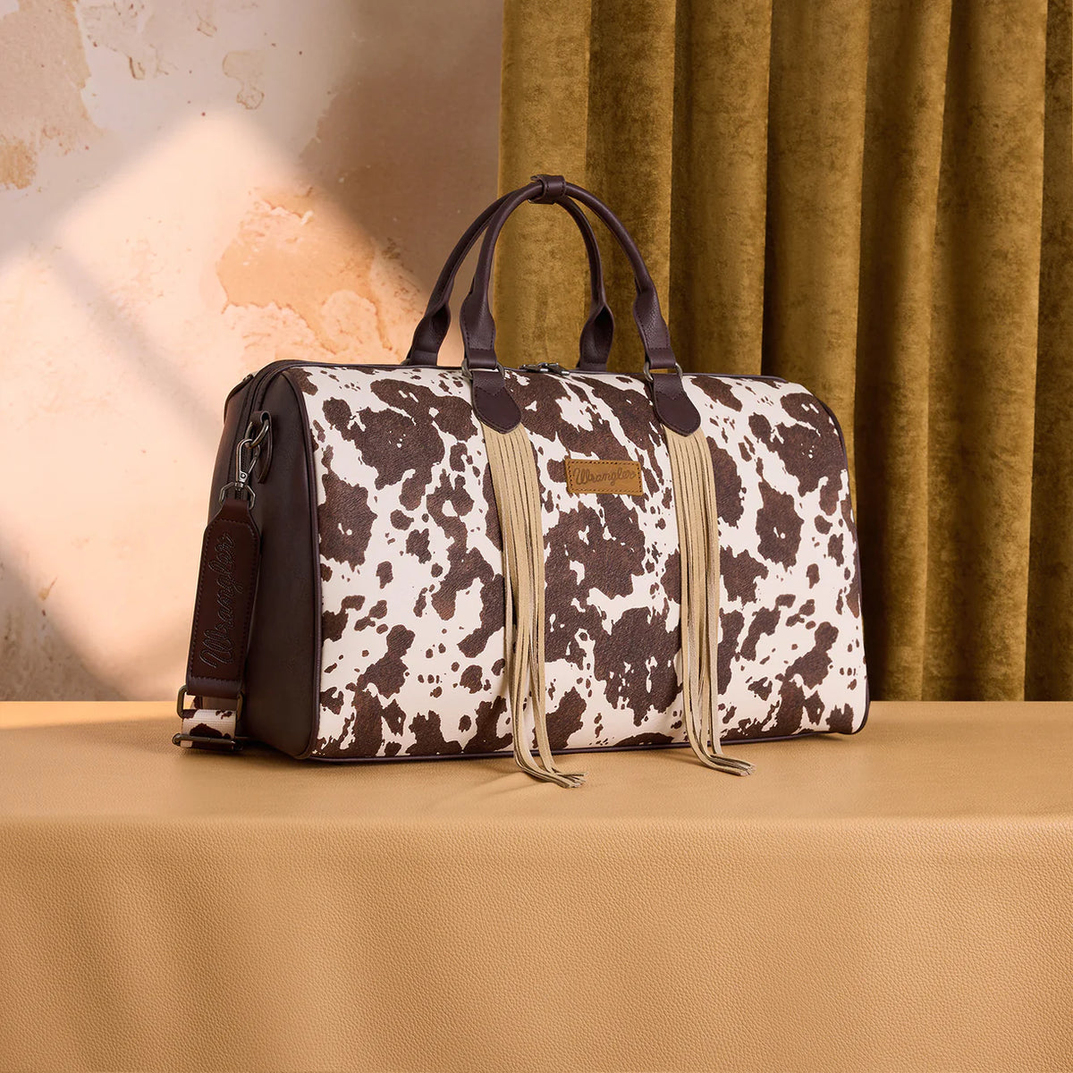 Wrangler Cow Print Fringe Duffle Crossbody