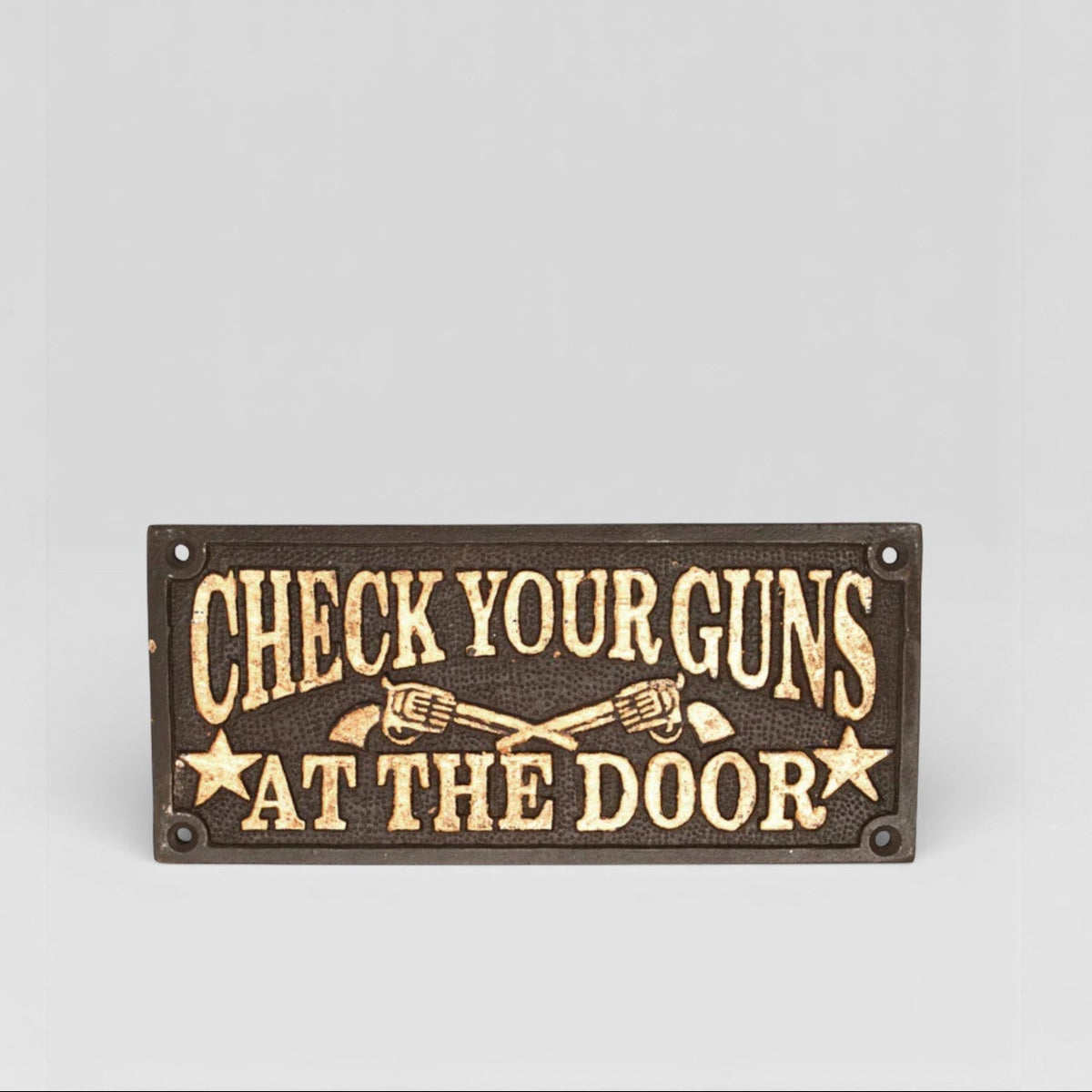 Check Your Guns At The Door Plaque
