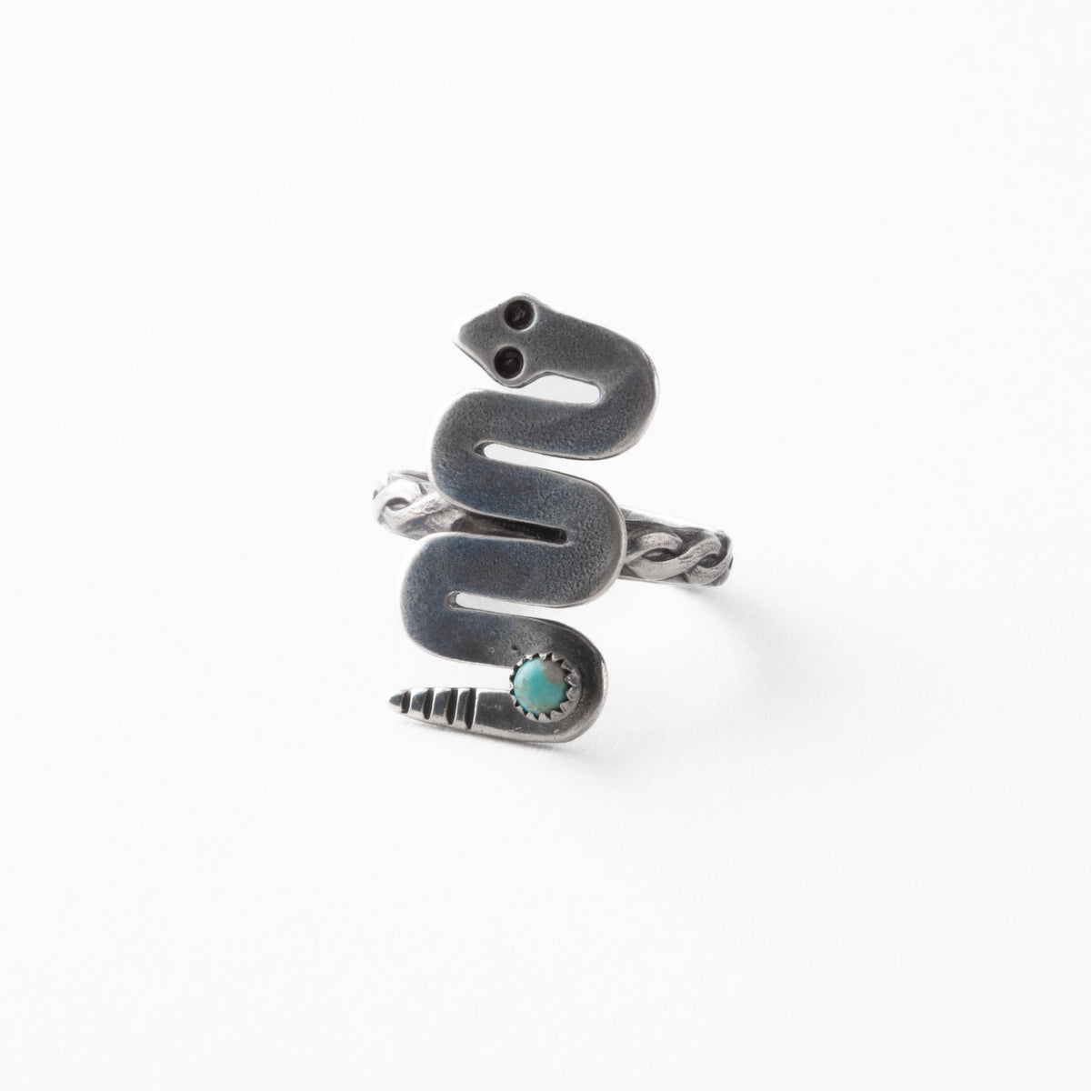 Silver snake-shaped ring with turquoise stone on a white background