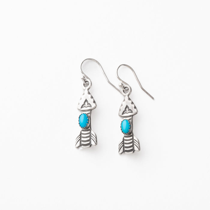 Silver arrow earrings with turquoise stones on a white background