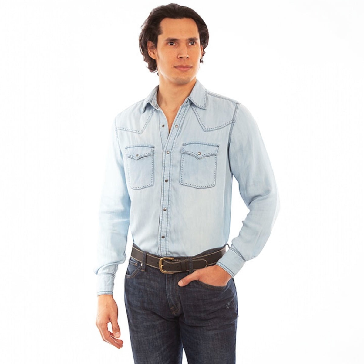 This easy-fit lightweight shirt is great for those warmer summer days. It features single point yokes front and back with pick stitch trim. This shirt is a snap front and cuff closure and has two chest flap pockets with snap closures. A dark blue pick stitch runs throughout. Machine wash in cold water with like colors and tumble dry low and promptly remove.
