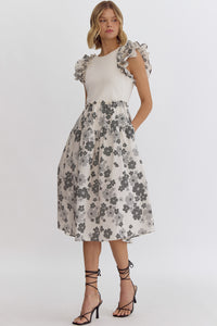 Cream: Floral print round neck ruffle sleeve midi dress featuring solid top. Pocket at sides. Lined. Woven. Non-sheer. Lightweight.