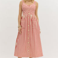 Red: Stripe pattern sweetheart neckline strap shoulder dress featuring cutout details at side. Pockets at front. Front button closure with elasticated waistband at back. Lined. Woven. Non-sheer. Lightweight.