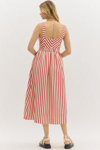 Red: Stripe pattern sweetheart neckline strap shoulder dress featuring cutout details at side. Pockets at front. Front button closure with elasticated waistband at back. Lined. Woven. Non-sheer. Lightweight.