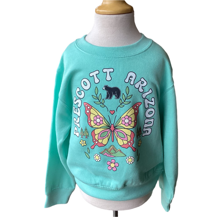 Turquoise sweatshirt with butterfly design and text stating Prescott, Arzona.