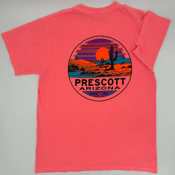 Coral t-shirt with a desert scene and 'Prescott Arizona' text on a gray background