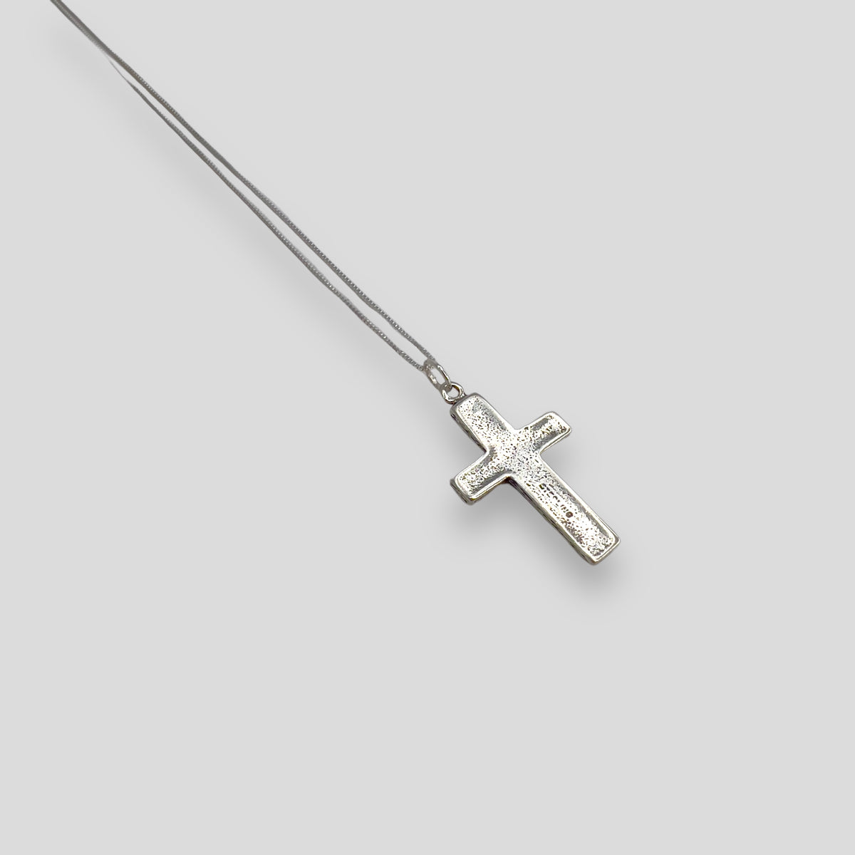 Small Sterling Silver Raised Cross Pendant Necklace