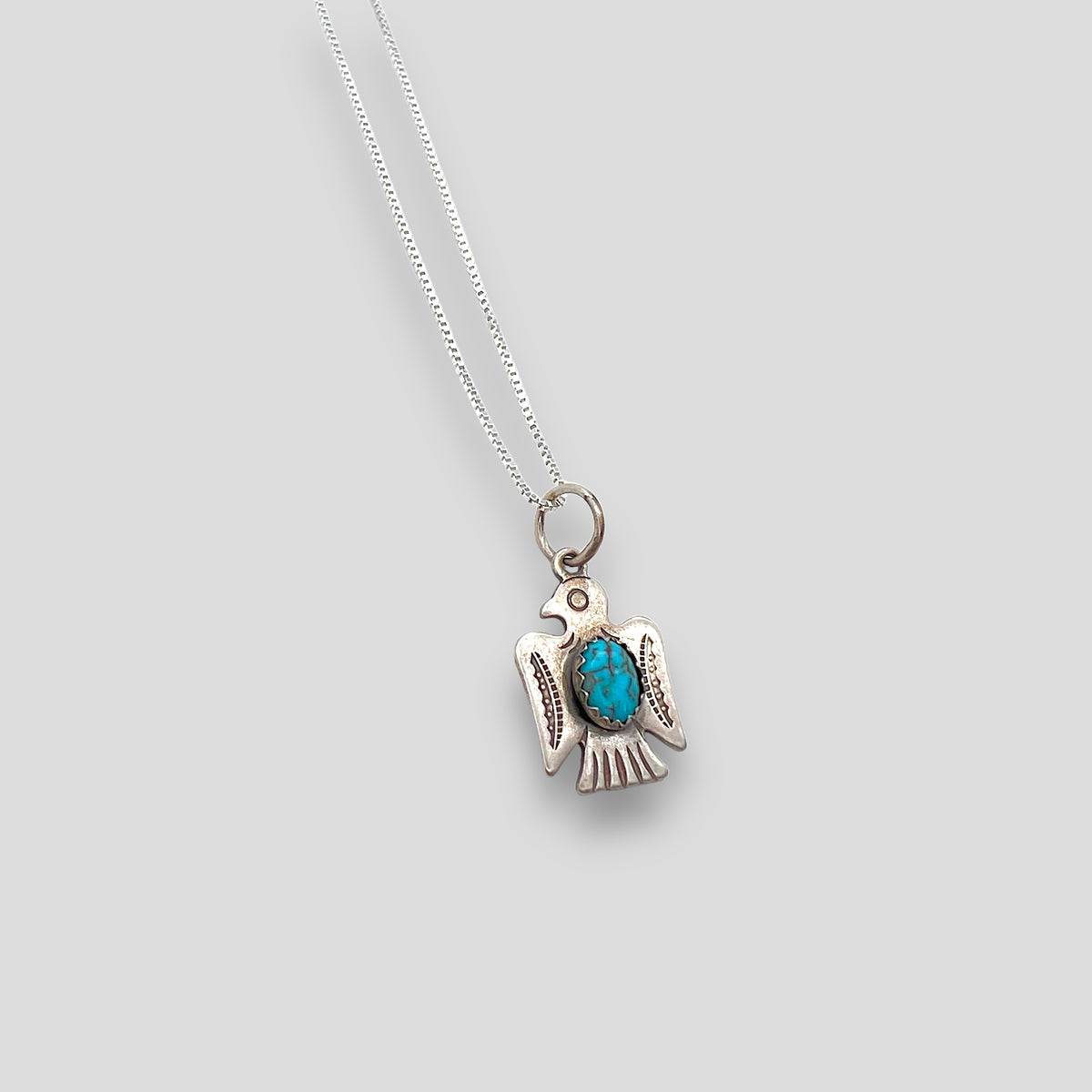 Small Turquoise and Sterling Silver Thunderbird Pendant Necklace