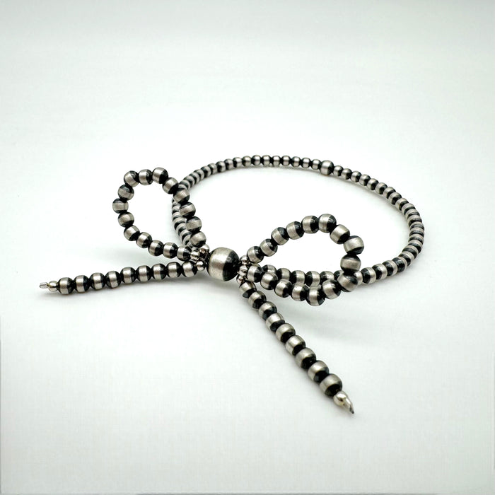 Navajo Pearl Sterling Silver Bow Stretch Bracelet - Thin