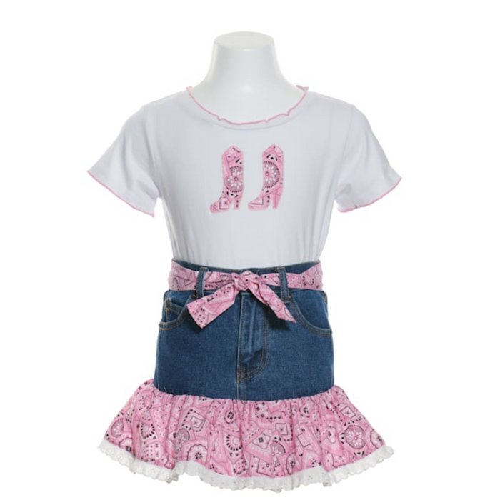 Children's outfit with white shirt, denim apron, and pink skirt on a mannequin against a white background.