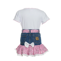 White t-shirt with denim skirt and pink ruffled hem on a white background