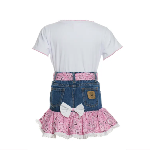 White t-shirt with denim skirt and pink ruffled hem on a white background