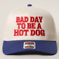 BAD DAY TO BE A HOT DOG Embroidered Trucker Hat : RYL/NATL / One Size