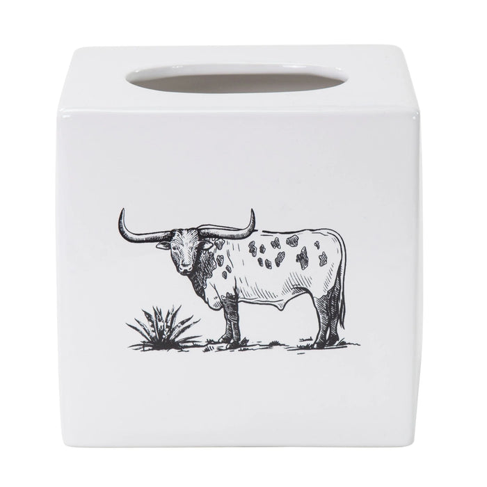 White ceramic tissue box cover with a black and white bull illustration on a white background